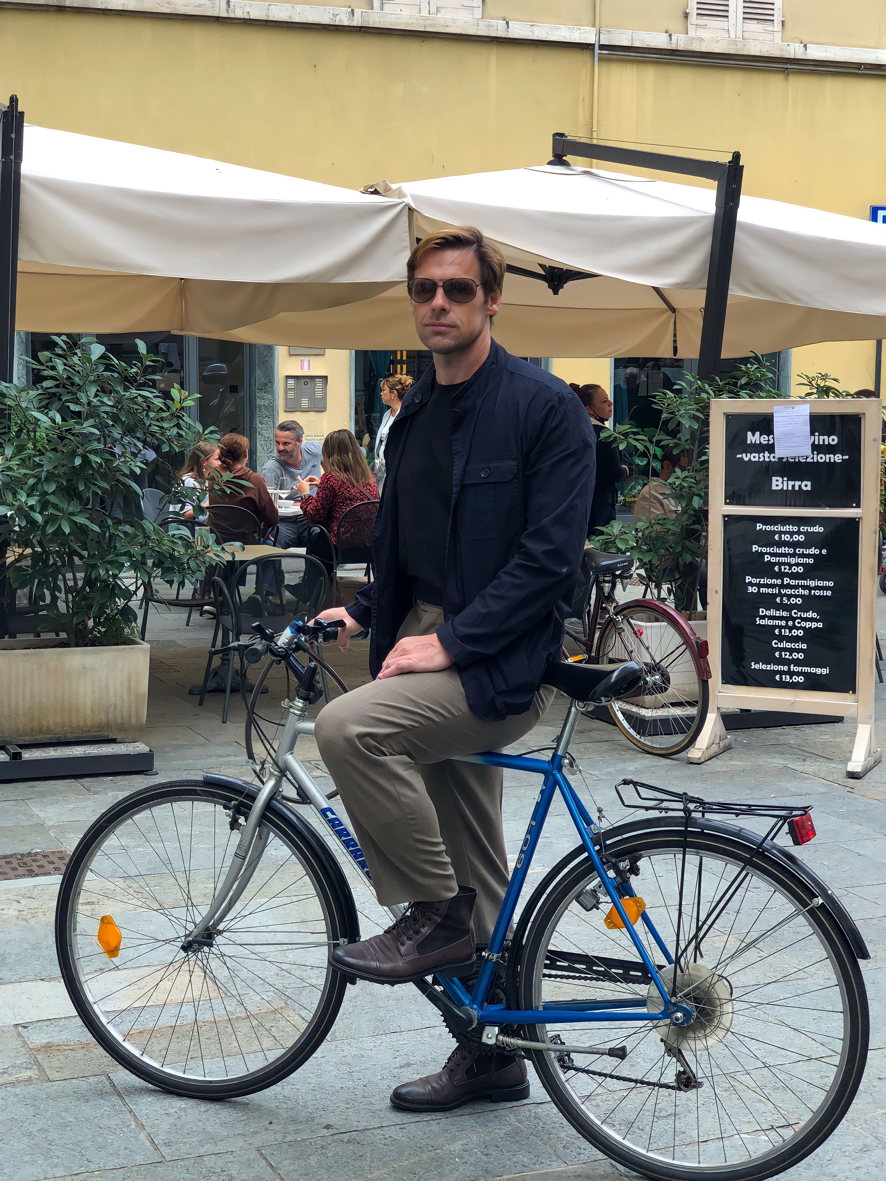 Simone on bicycle in Italy